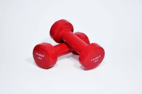 Basic breast enlargement exercises are performed with dumbbells
