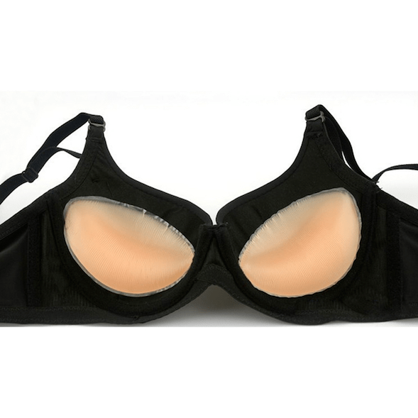 Bra with silicone inserts for breast enlargement